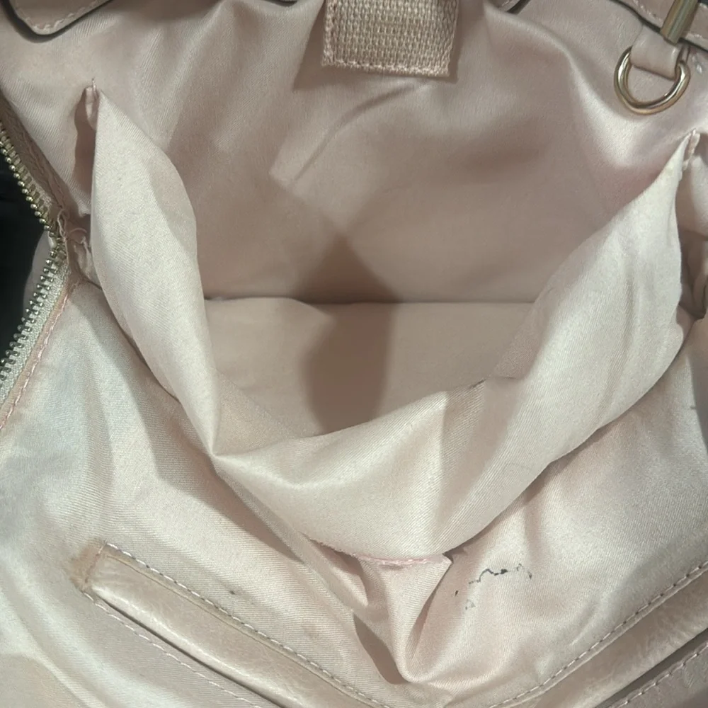 Blush perforated backpack